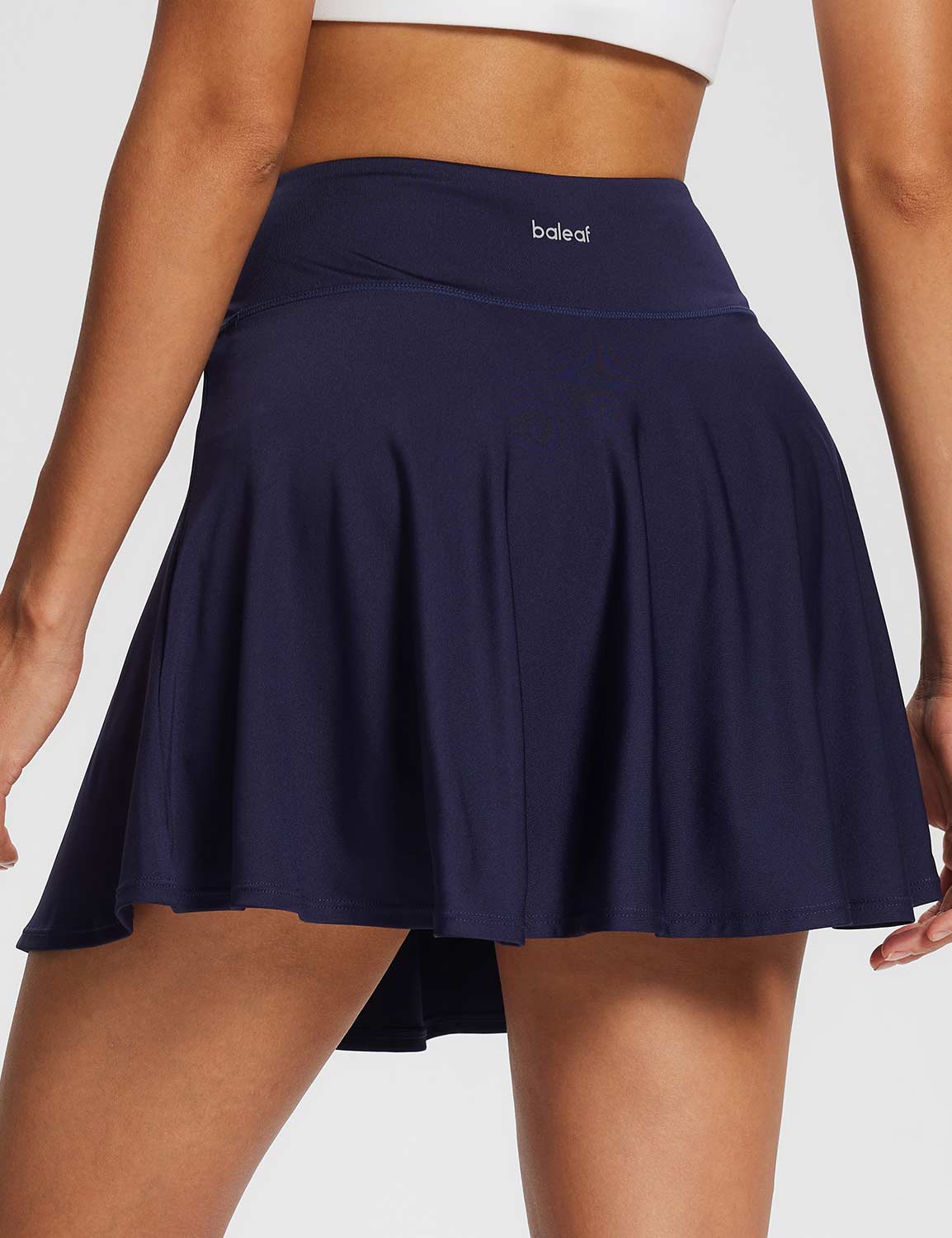 Baleaf Women's High-Rise Pleated Tennis Skirts w Ball Pockets Peacoat Back